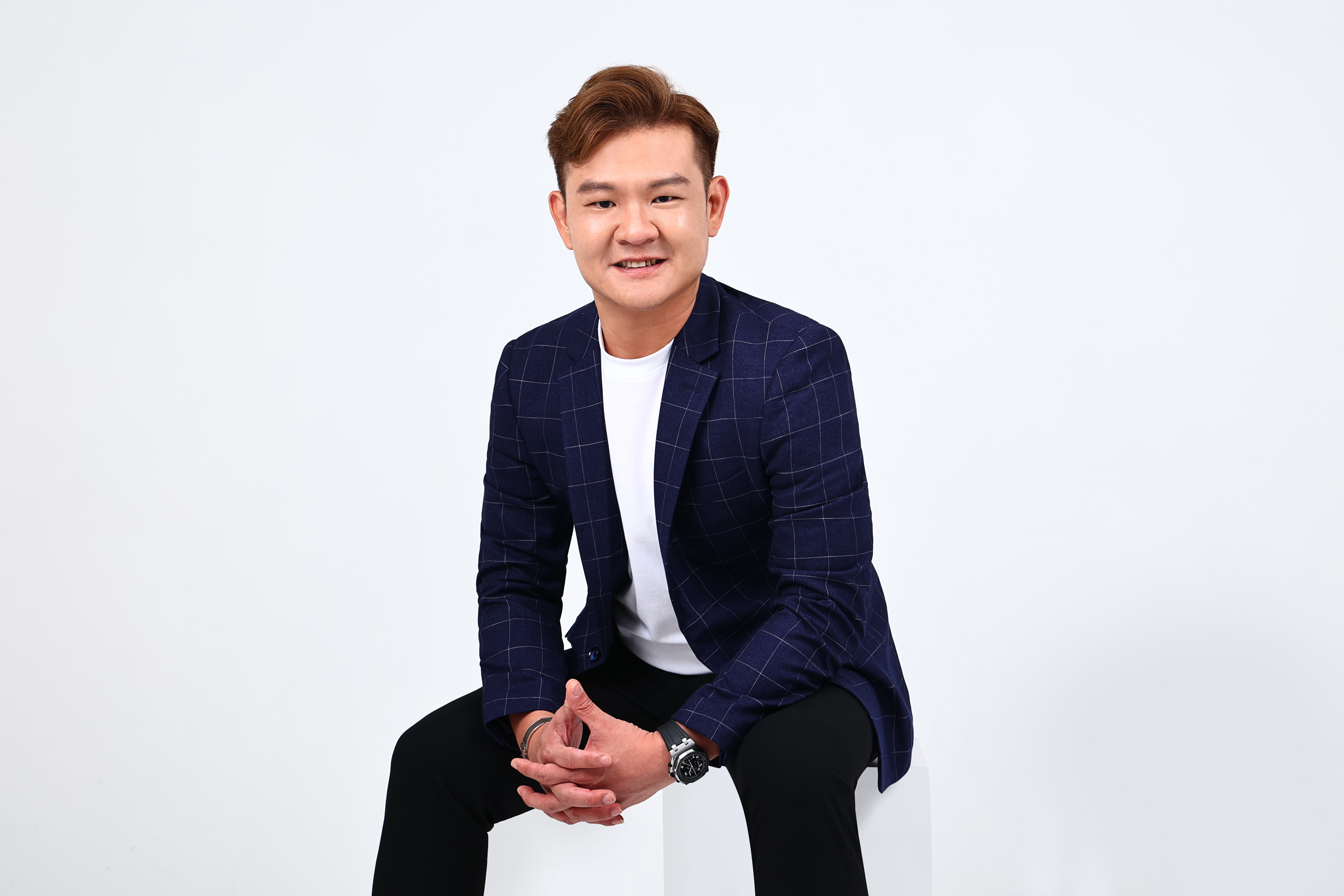 Portrait of Freddie Xu, PropNex Branch District Director and property adviser